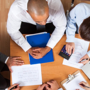 group of business people with paperwork