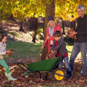 Family outside enjoying fall